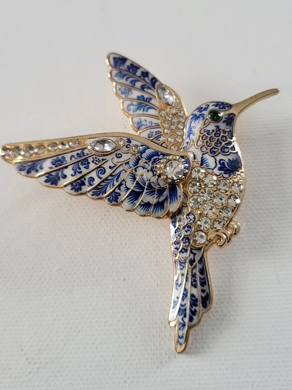 Elegant Blue & Gold Hummingbird Brooch - Ornate Crystal Accent